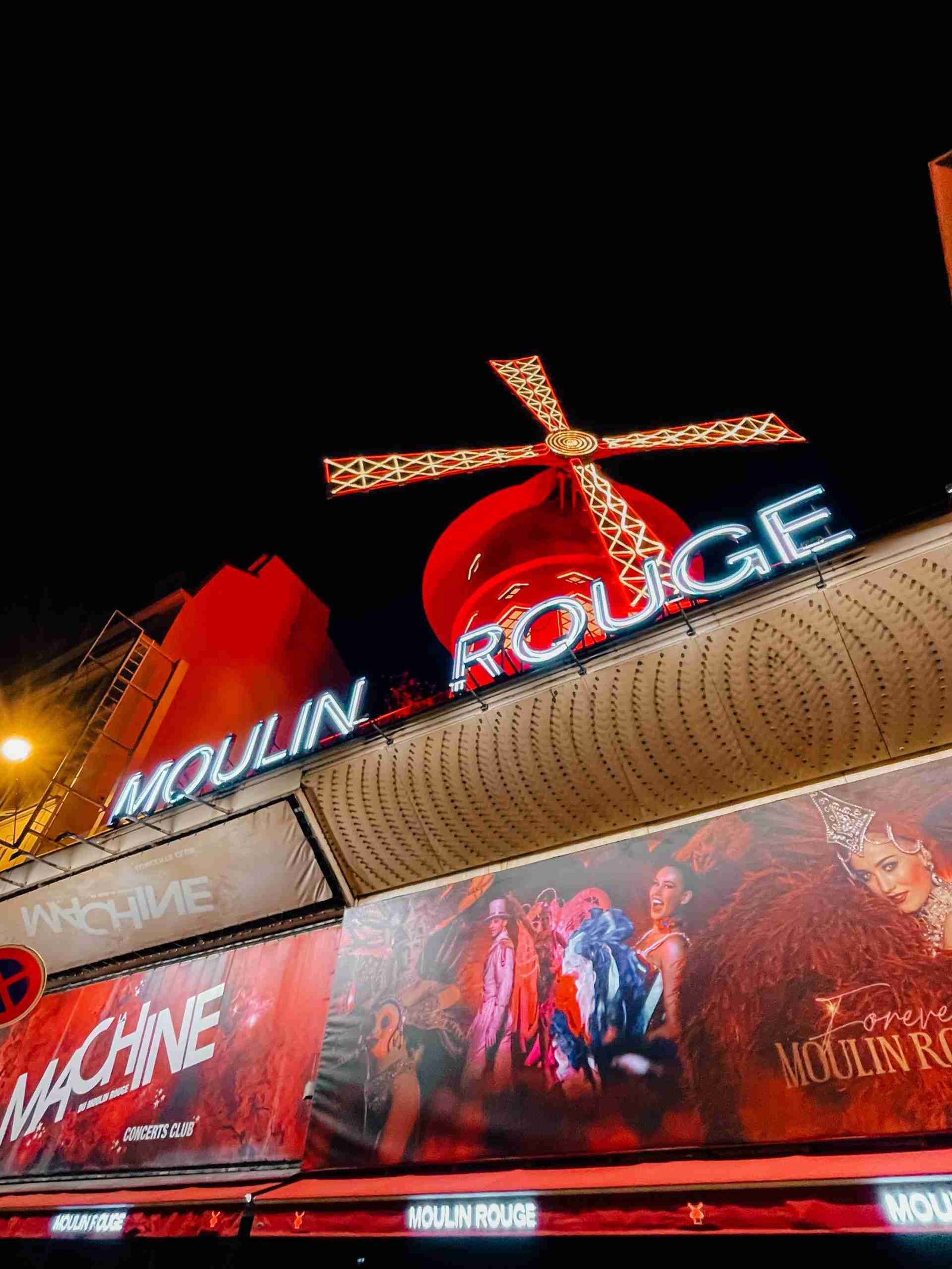 outside of the Moulin Rouge at night