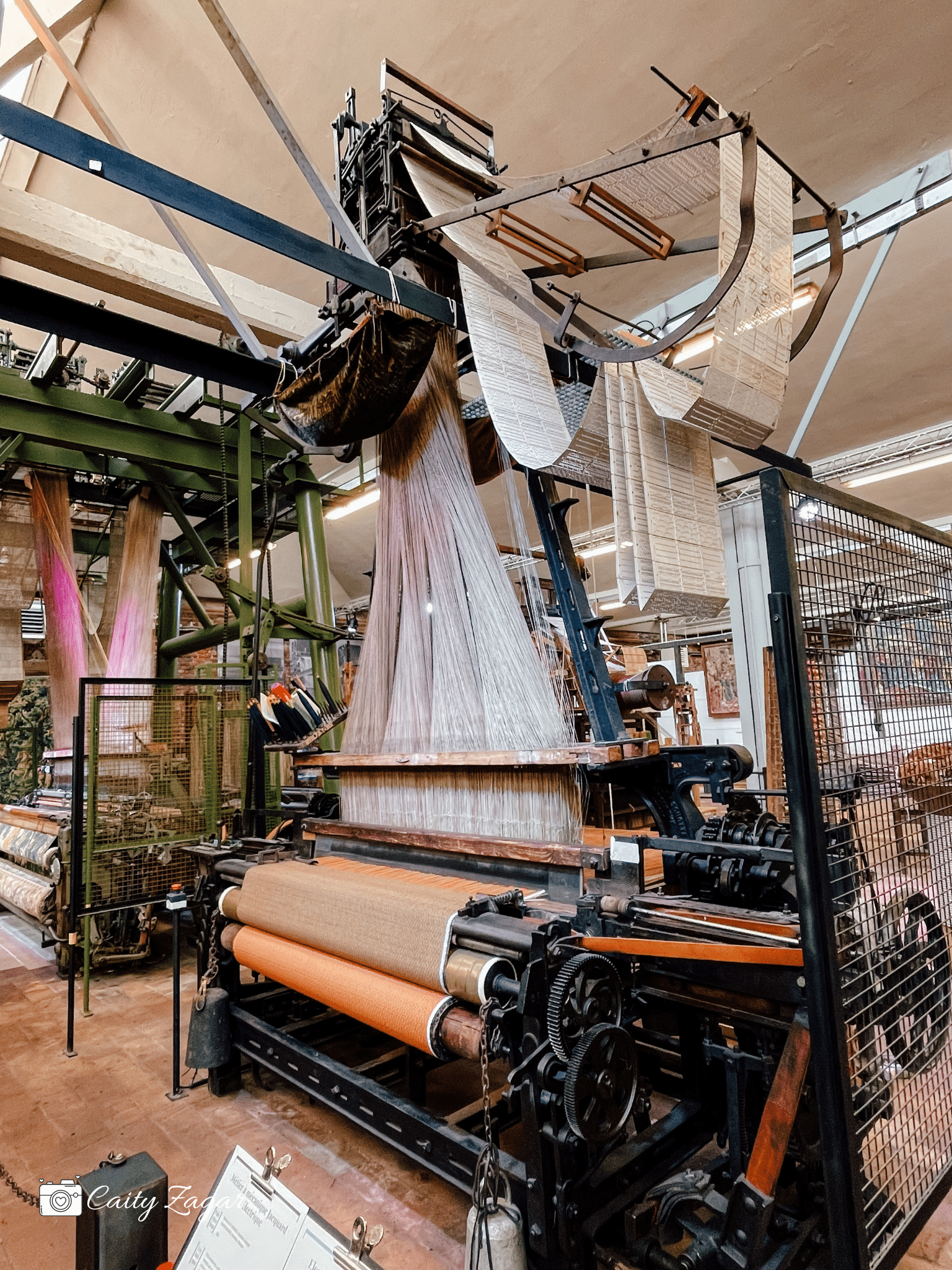 one of the most interesting things to do in Roubaix is visit La Manufacture - here you see a large loom with thousands of threads hanging above it