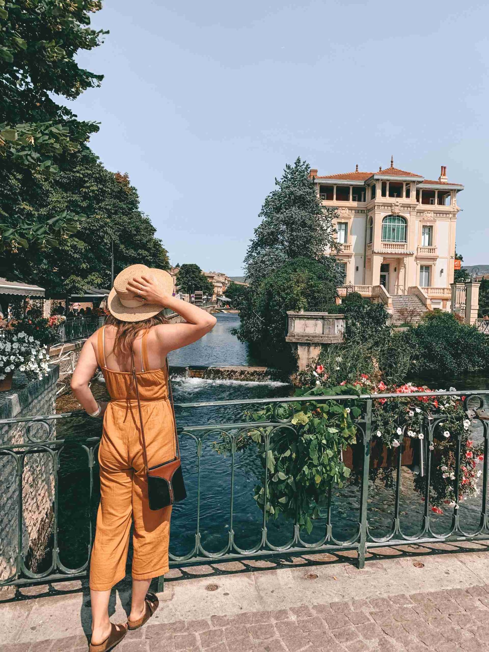 Small town in Provence - holding onto my hat to avoid it being blown away by the wind!