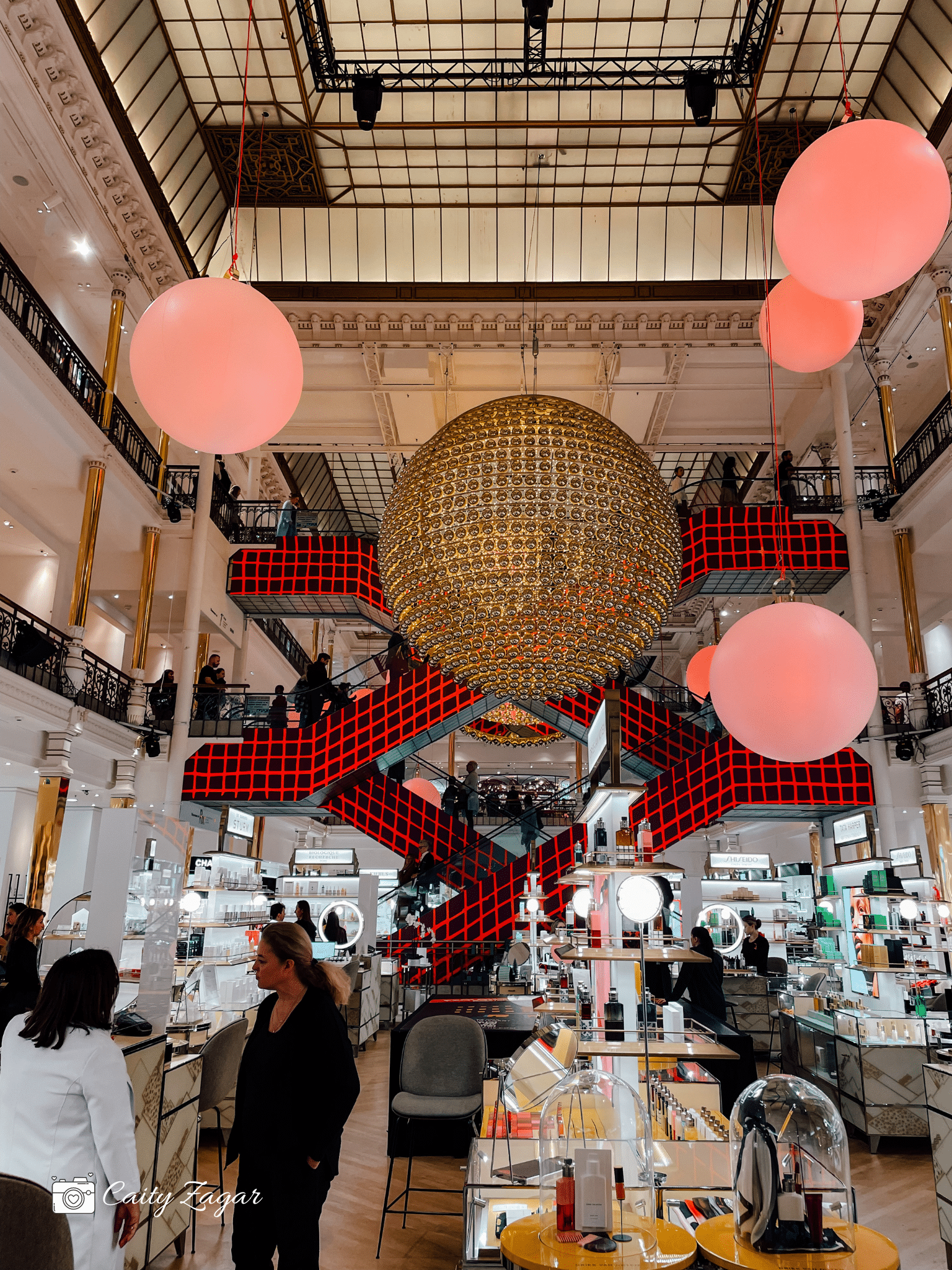 The iconic elevators and holiday displays inside Le Bon Marche